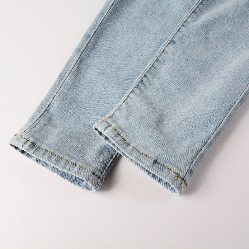 LIGHT LEATHER PATCH JEANS