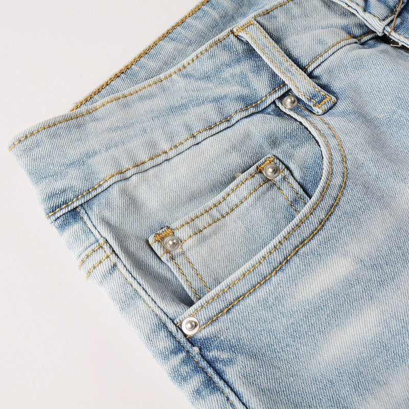 LIGHT LEATHER PATCH JEANS