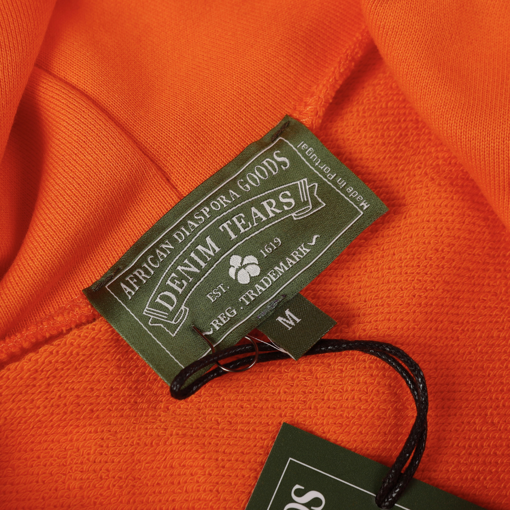 DENIM TEARS ORANGE TRACKSUIT