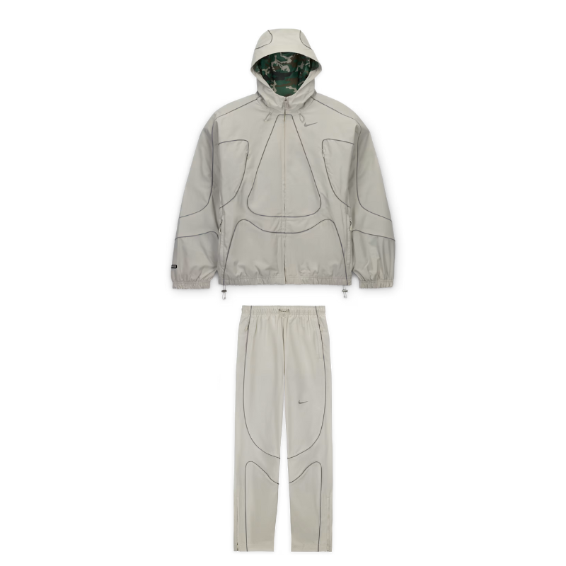Conjunto Chándal Corteiz x Nike – Gris Reflectante