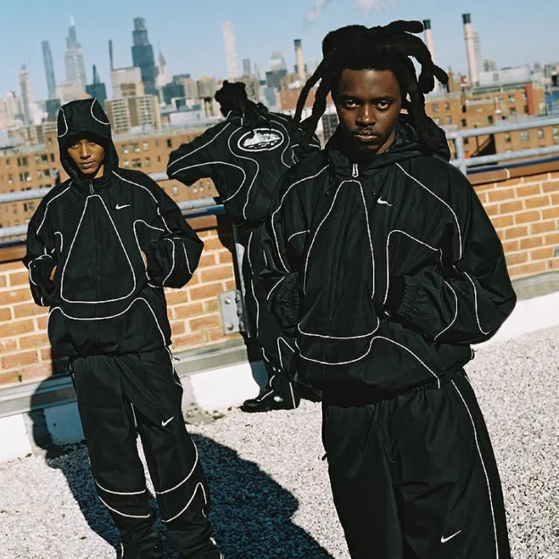 Conjunto Chándal Corteiz x Nike – Negro Reflectante
